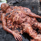 Illustration for article titled The Streets Are Paved With Half-Melted Zombies In A Tense emWalking Dead/em